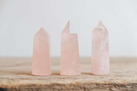 Violet amethyst crystal on wooden background. Copy, empty space for text.の写真素材