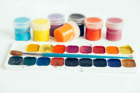 Watercolor paints on a white background. Copy, empty space for text.の写真素材