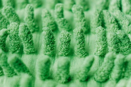 Pile of green rug close up or carpet texture. Copy, empty space for text.の写真素材