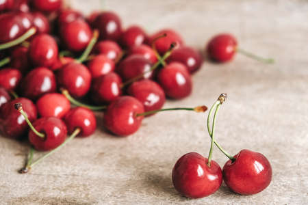 Fresh ripe cherries on wooden background. Copy, empty space for text.の写真素材