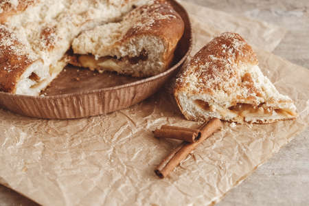 Sliced homemade apple pie on vintage wooden background texture. Top view. Copy, empty space for text.の写真素材