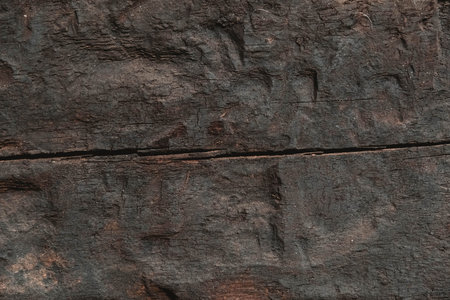 Old brown wooden texture with cracks and scratches as a background image. Copy, empty space for text.の写真素材