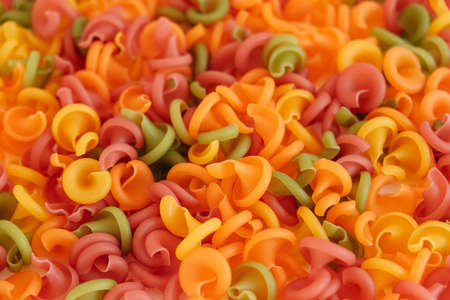 Multicolored pasta as a background image. Top view. Copy, empty space for text.の写真素材