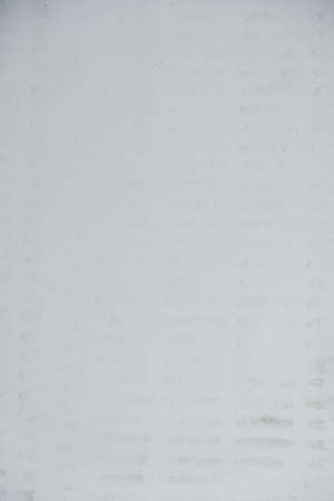 White dirty paper as background texture image. Top view. Copy, empty space for text.の写真素材