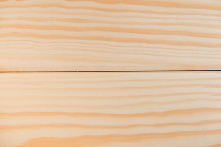 Joiner's boards from light natural wood. Timber harvesting. Details of a lumber bar. Hobbies of...