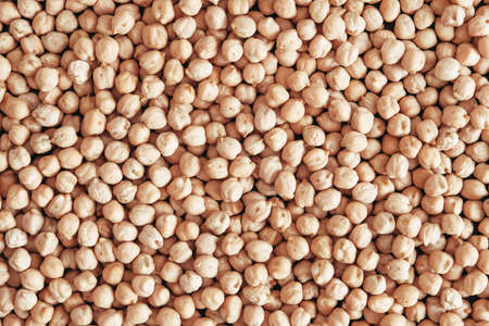 Dry chickpeas as a background texture. Top view. Copy, empty space for text.の写真素材