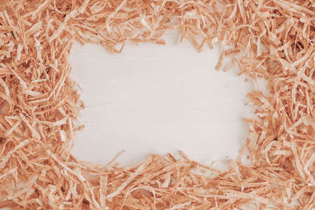Wood shavings on white background. Top view. Copy, empty space for text.の写真素材
