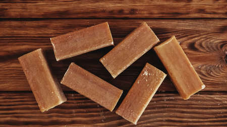 Laundry soap brown on a wooden background.の写真素材