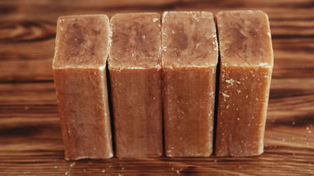 Laundry soap brown on a wooden background.の写真素材