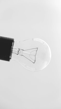 Transparent light bulb on a white background.の写真素材