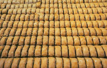 Oriental desserts (baklava) at the market. Food concept background.の写真素材