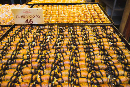 Jerusalem, Israel - May 7, 2019 : Fresh baked buns and croissants on trays at Mahane Yehuda market in Jerusalem.のeditorial素材