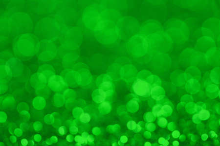 Abstract bokeh background. Defocused christmas lights. Party, holiday and festive concept. Invitation card themeの写真素材