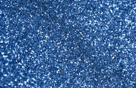 Abstract glittering background. Christmas or birthday backdrop. Party, holiday and festive concept. Invitation card themeの写真素材