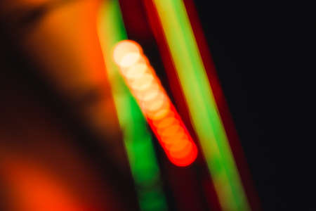 Abstract defocused background of colorful city lights at night. Blurry backdropの写真素材