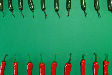 Creative chilli pepper background for posters, blogs, web design. Selective focus. Healthy food ingredient suitable for vegans and vegetariansの写真素材