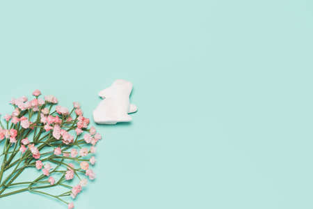 Creative easter composition with decorative  bunny and flowers . Minimal style. Abstract background. Copy space. Flat layの写真素材