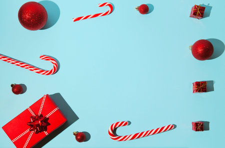 Winter composition on light blue background. Celebration and holiday concept. Top view. Flat lay....