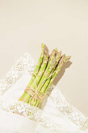 Green asparagus. Food suitable for vegans and vegetarians. Healthy cooking concept. Top view. Flat layの写真素材