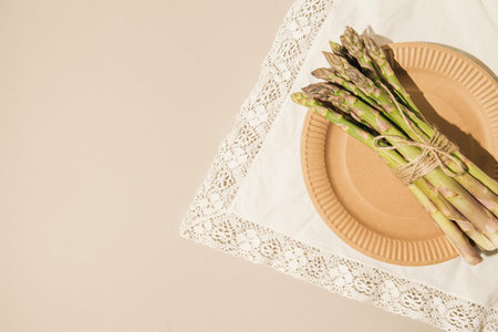 Green asparagus. Food suitable for vegans and vegetarians. Healthy cooking concept. Top view. Flat layの写真素材
