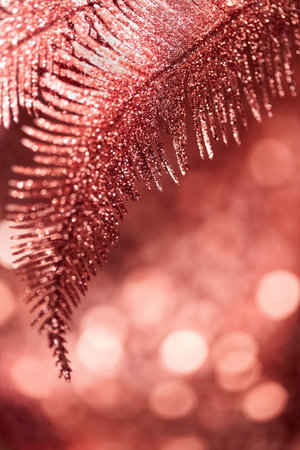 Decorative branch closeup on shiny bokeh background. Abstract holiday backdrop. Celebration and party concept.の写真素材