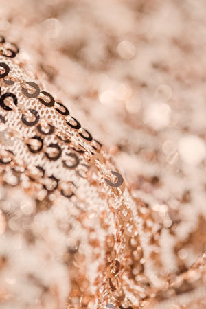 Abstract composition of fabric with shiny sequins. Holiday and party concept texture. Selective...