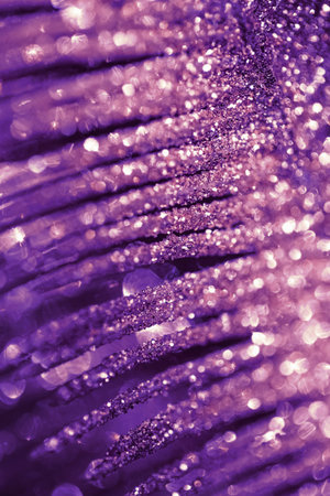 Abstract composition made of a decorative branch closeup. Shiny festive and holiday background. Celebration and party concept.の写真素材