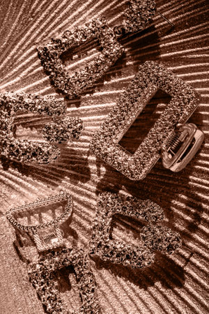 Women's accessories on textured background with shadow. Fashionable outfit with earrings and hair clip. Fashion and beauty concept. Color of the year 2025 inspiredの写真素材