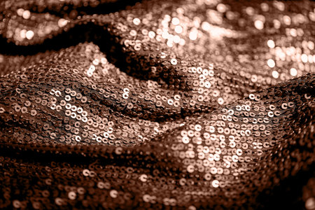 Abstract composition of fabric with shiny sequins. Holiday and party concept. Color of the year 2025 inspiredの写真素材