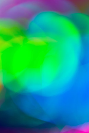 Abstract background made of bright blurred texture. Colorful light effect.の写真素材