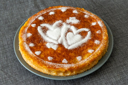 Homemade Cheesecake with Heart Shaped Sugar on top.の写真素材
