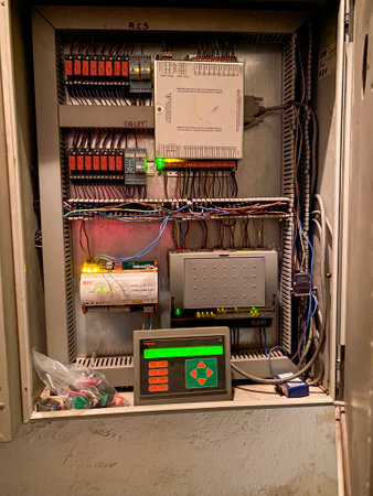 Interior of an old control panel with wires and contactors.の写真素材