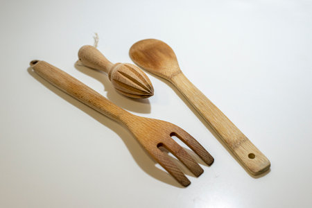 Wooden kitchen utensils on a white background. Cooking utensils.の写真素材