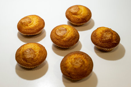 Freshly baked muffins on a white background. Select focus.の写真素材