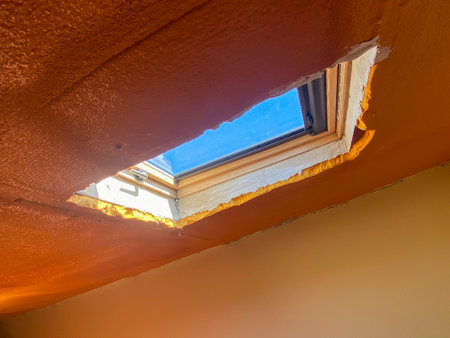 Window of a house under construction with blue sky and sun light.の写真素材