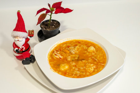 santa claus and shrimp soup with red leaf on white backgroundの写真素材
