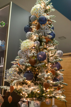Decorated Christmas tree in the interior of a modern shopping mallの写真素材