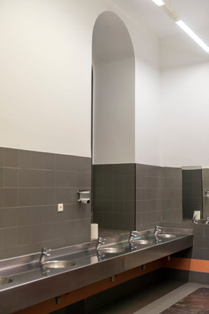 Interior of a modern bathroom in a public building. nobody inside