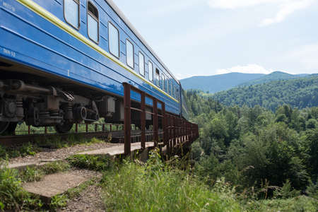 Being among the dense woods the train goes afarの写真素材