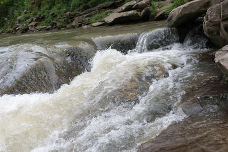 On a nerevny surface the small river flowsの写真素材