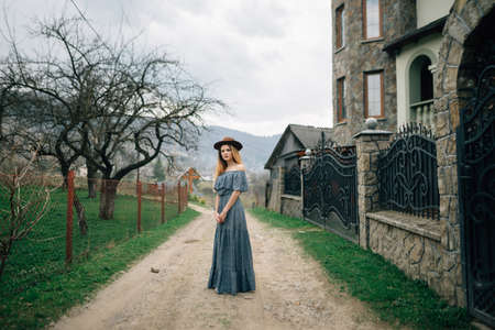 A girl in meditations on the path along the road to the dreamの写真素材