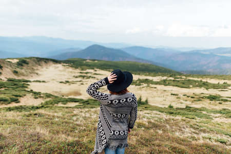 Photo of a girl in the mountains.の写真素材
