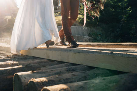 Preparing a newlywed for a wedding. The organization of a wedding in the mountains.の写真素材