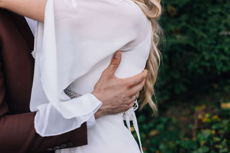 Walk lovers of the bride and groom in the forest Carpathians high in the mountains.の写真素材