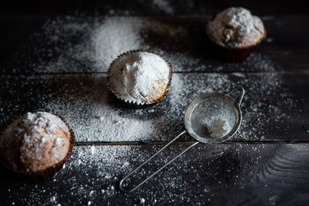 delicious homemade pastries on a wooden table. Place under the textの写真素材