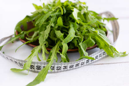 diet food, a great opportunity to throw off extra killograms. Fresh Arugula is a great source of trace elements.の写真素材