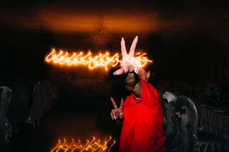 bright night party movement of hands and bodies, full drive and fly away while dancing. Great partyの写真素材