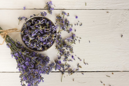 miniature Provencal composition of fragrant lavender herbs. bouquet of flowers and a bowl of herbs....