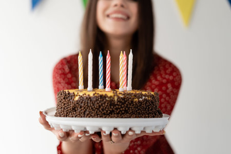 Close-up of a beautiful and mouth-watering cake. Birthday candles Make a wish. holiday party
