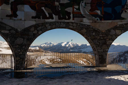 Georgian military road, a monument from the time of the Union of Peoples Friendship Arch in the winter. Place for textのeditorial素材